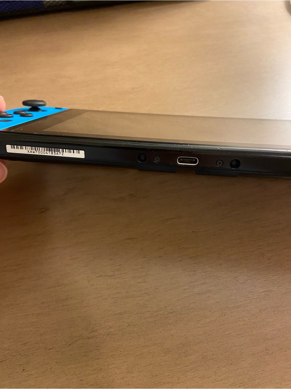 Nintendo Switch with Blue and Gray Joy-Con Controllers - Picture 5 of 9
